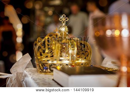 church ritual crown at wedding with stars