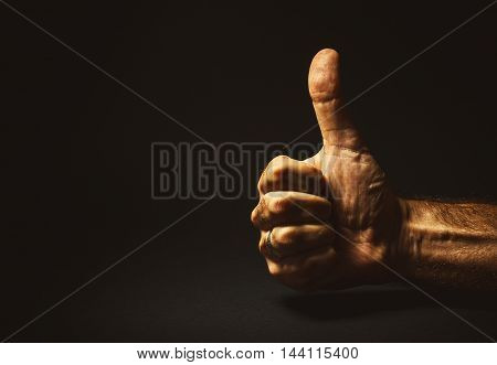 Man's hand showing that everything is all right.