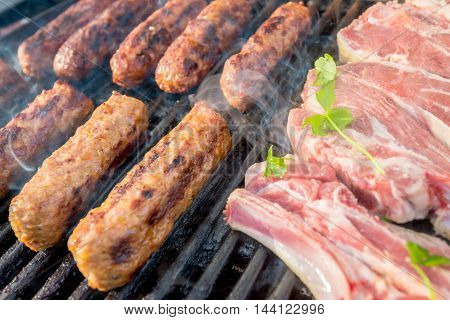 Delicious australian made chevapchichi sausage rolls and stakes cooked on BBQ
