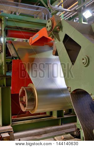 Metal coils machine in steel plant, close up