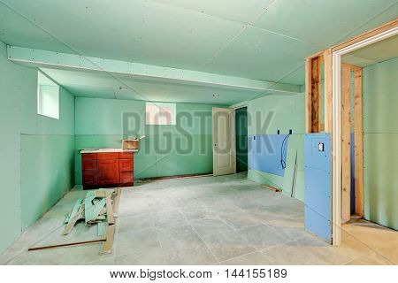 Basement Renovation. Mint Green Walls And Tile Floor