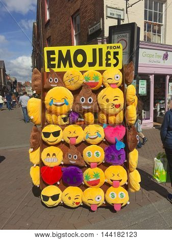 HEREFORD, UK - APRIL 02, 2016: Emoji expressions for sale as cushions in Hereford town centre, Hereford, Herefordshire, UK