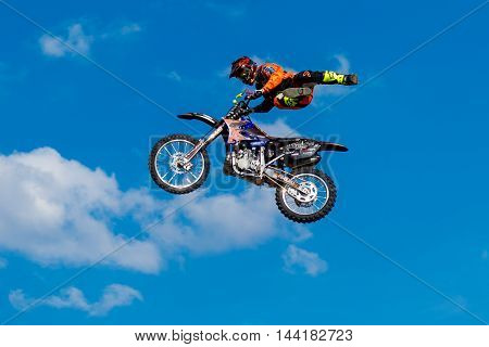 August 6 2016. Ryazan Russia. A professional rider at the FMX (Freestyle Motocross) make an acrobatic jump at the motorshow. Documentary Editorial Image.