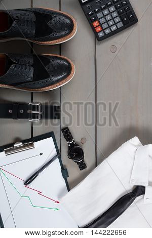 Businessman, Work Outfit On Grey Wooden Background. White Shirt With Black Tie, Watch, Belt, Oxford