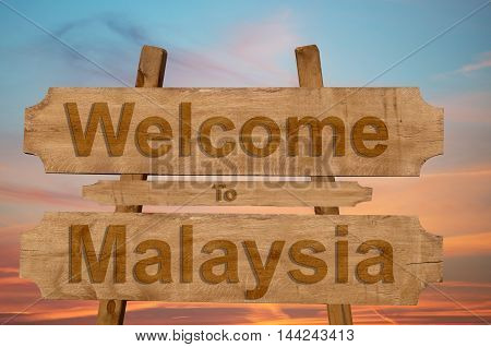Welcome To Jamaica Sign On Wood Background With Blending National Flag