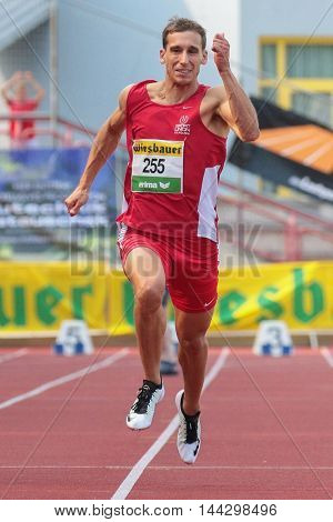 KAPFENBERG, AUSTRIA - AUGUST 8, 2015: Benjamin Grill (#255 Austria) participates in the national track and field championship.