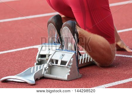 KAPFENBERG, AUSTRIA - AUGUST 8, 2015: An athlete prepares for the national track and field championship.