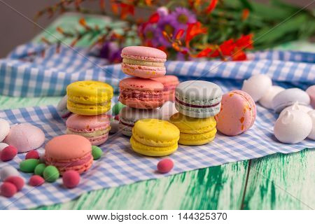 Dessert still life of macaroon cookies and marshmallow