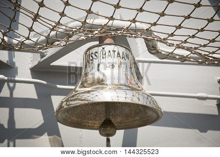 NEW YORK MAY 26 2016: The brass bell of the USS Bataan (LDH 5) an amphibious assault ship moored at Pier 88 for Fleet Week NY 2016.