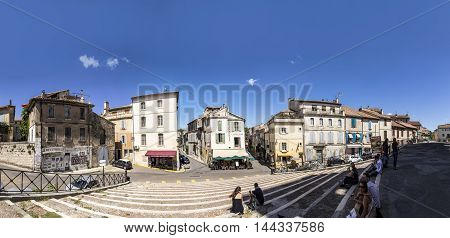 Panoramic View With People From Famous Arena In Arles To Old Town