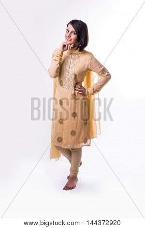 shy indian pretty woman with arms crossed against white background
