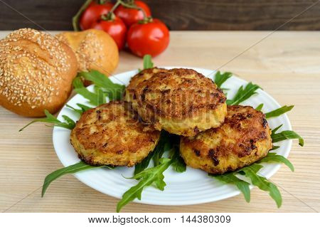 Juicy homemade cutlets (beef pork chicken) on a white background. For a hamburger.