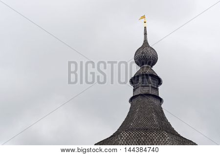 A wooden dome with a weather vane in Rostov Kremlin.