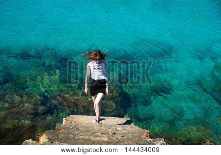 a young woman goes up postupen'kam from a sea