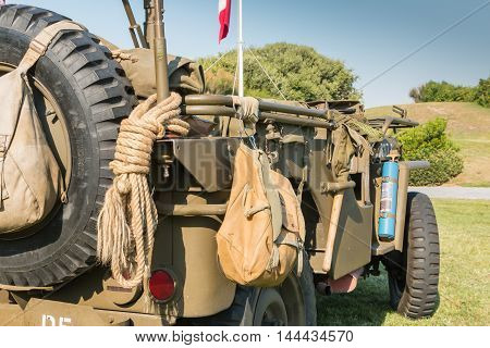 Us Military Bag And Strings On A Jeep In Exhibition