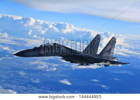 Military Russian Fighter Jet Flying In The Sky