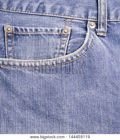 Closed up front pocket blue jeans or denim.