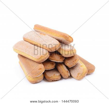 Pile of multiple ladyfinger savoiardi biscuit cookies, composition isolated over the white background