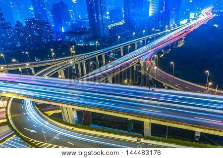 crowded cars driving at flyover,long exposure.