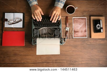 Retro reporter working at the table, top view