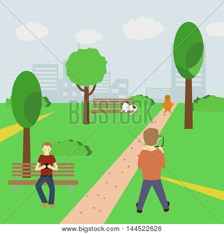 Man playing an augmented reality game using location information in park catching characters and holding smartphone in his hands