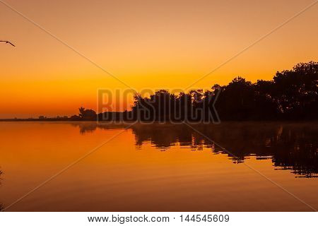 Beautiful sunrise on the Dnieper River. A fantastic spectacle.