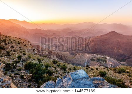 Scenic view of Al Hajar mountains in the Sultanate of Oman at sunset