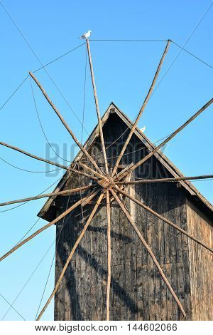 Ancient wooden windmill old town Nessebar Bulgaria