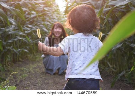Mother And Her Son Are Palying Outer Place