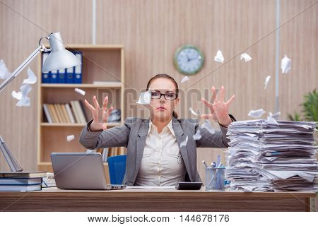 Busy stressful woman secretary under stress in the office