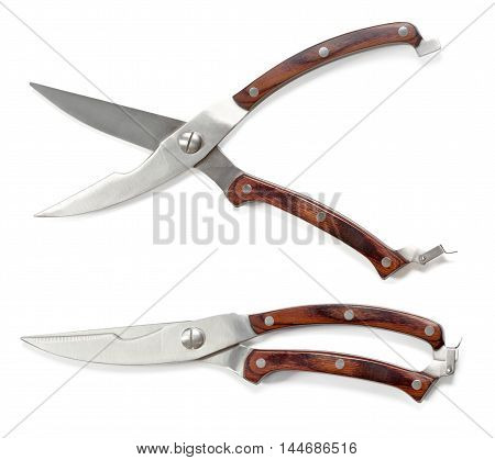Two kitchen scissors isolated on white background