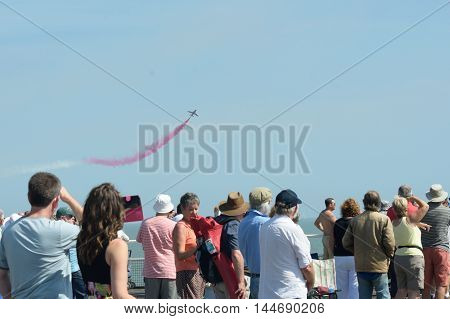 Clacton on Sea United Kingdom - August 26 2016: Crowd watching acrobatic air display at Free air show Clacton air show