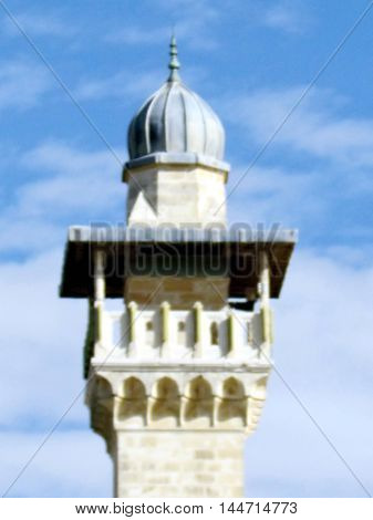Jerusalem Israel - December 2 2012: The top of minaret of Al-Aqsa Mosque in the old city.