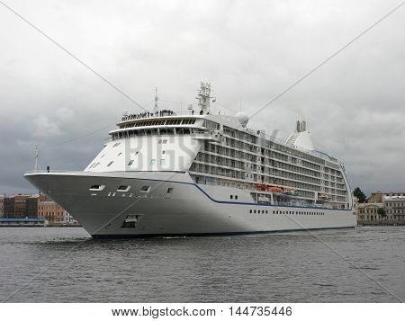 Passenger ship on the Neva. Cruise liner in Saint Petersburg. The journey on the ship. Saint Petersburg, Russia.
