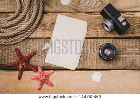 blank paper and equipment on a wooden table