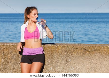 Woman Drinking Water After Sport Gym Outdoor