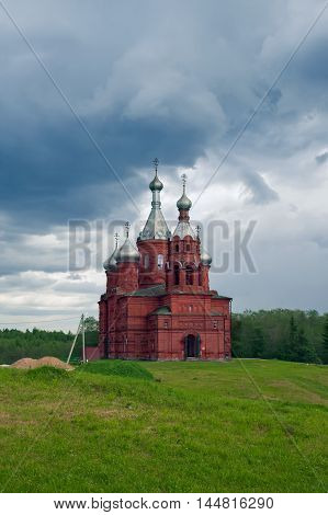 TVER OBLAST RUSSIA - JUNE 02 2016: Olgas ancient orthodox church of the 17th century at the source of Volga river Tver oblast Russia in June 2016