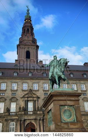 The equestrian statue of King Frederik VII in front of the Christiansborg Palace in Copenhagen Denmark