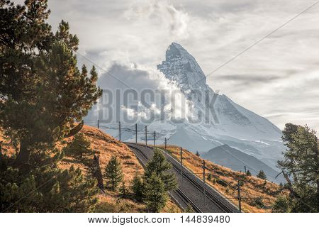 Matterhorn Peak With Railway Against Sunset In Swiss Alps, Switzerland