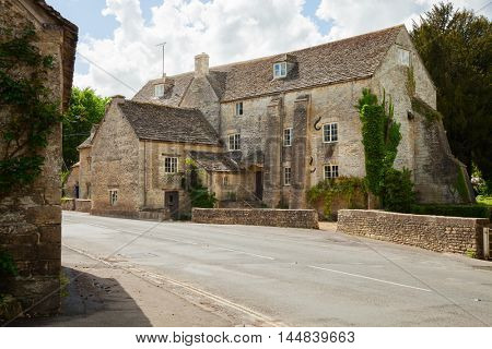 Old street in  Bibury (Arlington Mill),  Gloucestershire,  England, UK.