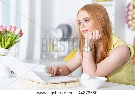 Portrait of a ttractive young girl using laptop