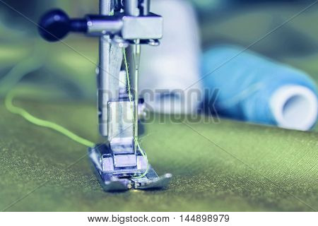Modern sewing machine . Fragment . Modern sewing machine .