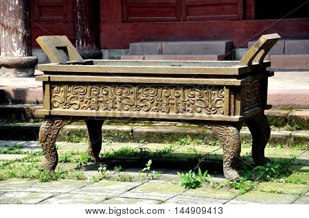 Chongzhou China - September 27 2009: Incense brazier with ornate designs at the Lu You Ancestral temple