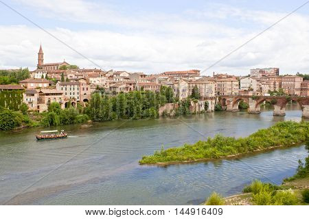 boat in Tarn river with a view of Albi France