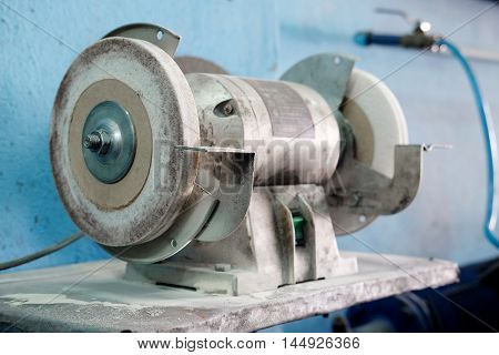 The image of grinding machine under thew white background