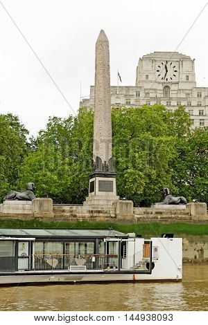 LONDON UK - JULY 8 2016: Cleopatra's Needle in London is one of three similar named Egypian obelisks and is located in the City of Westminster on the Victoria Embankment.