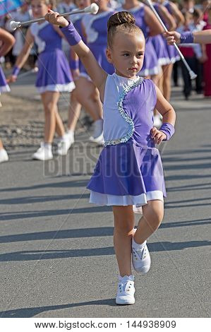 GOTTLOB ROMANIA - AUGUST 14 2016: Parade of small cheerleaders with occasion Festival of watermelon 