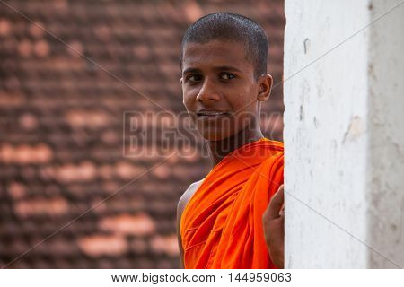 MADU GANGA - NOVEMBER 14, 2015 SRI LANKA : Portrait of a Buddhist monk in monastery at river