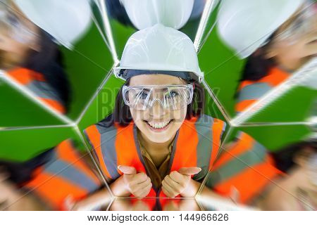 Portait of a beautiful young asian female worker in mirrow reflection