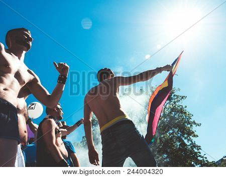 Strasbourg, France - Jun 10, 2017: Vintage Filter Over Caucasian Excited Gay Men People Dancing Wavi